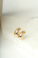 Brinco gota arredondada